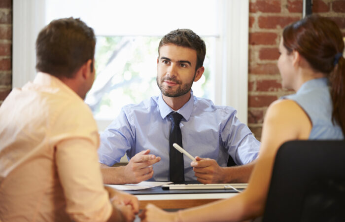 The Best Debt Consolidation - Three Persons Discussing With Sitting on the Chair