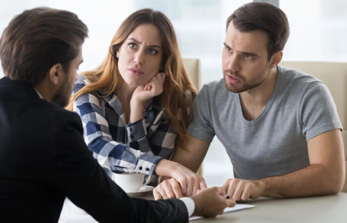 Two Persons Discussing for the Best Debt Management Plan